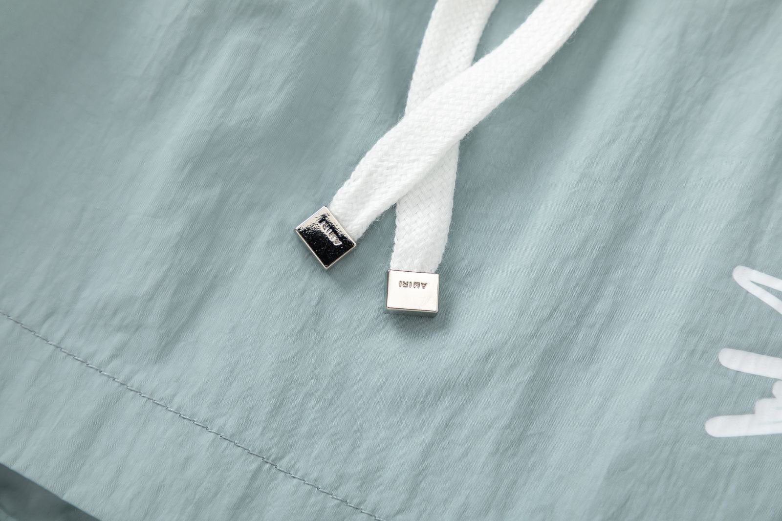 AMIRI Starburst logo shell swim shorts